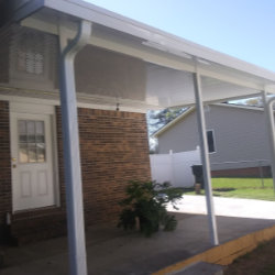 Patio cover providing shade for an outdoor sitting area